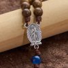 Christianartworkshop Handmade Gold sandalwood Rosary with Our Lady of Guadalupe: A Faithful Companion