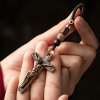 Sophisticated Metal Crucifix with Braided Rope Keychain: Exclusive Token of Divine Sacrifice