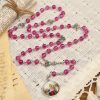 Pink Glass Rosary Adorned with Our Lady of Guadalupe: A Love - Filled Blessing