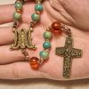 PRAYERFUL FAITH: Handcrafted Green Ceramic Rosary with Amber Beads