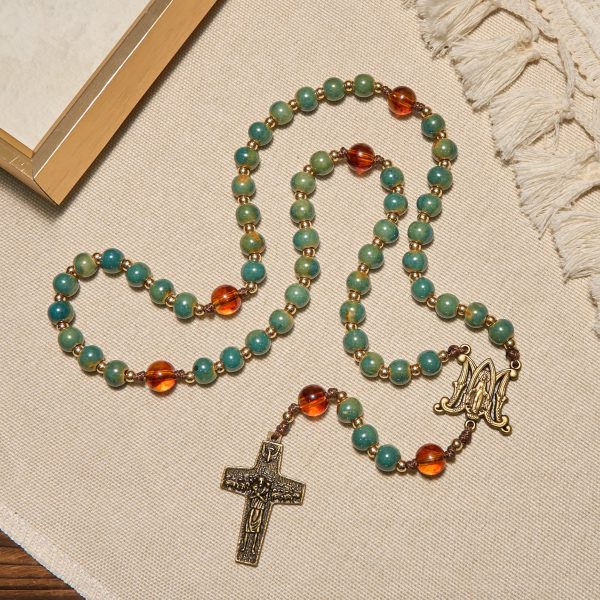 PRAYERFUL FAITH: Handcrafted Green Ceramic Rosary with Amber Beads