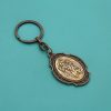 Intricately Carved Multicolor St. Christopher Keychain: Based Companion for Safe Travels