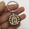 Elegant Virgin Mary Pendant Keychain: Medal of Faith and Floral Beauty