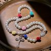 Elegant Pearl Rosary with Multicolor Rose Accents Reflecting Devotion and Faith