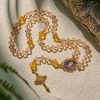 Shimmering Amber Beads Rosary Featuring Graceful Our Lady of Guadalupe Medal