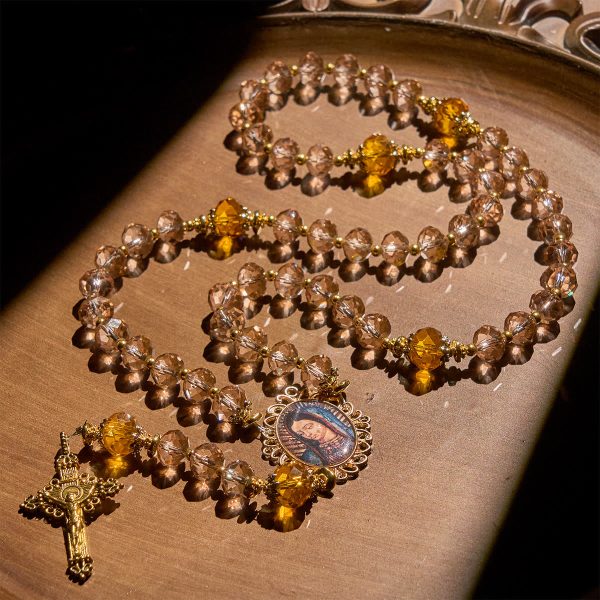 Shimmering Amber Beads Rosary Featuring Graceful Our Lady of Guadalupe Medal