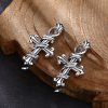 Retro - Inspired Sterling Silver Cross Earrings with Twisted Design: A Nostalgic Symbol of Faith