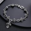 Retro - Styled Sterling Silver Cross Bracelet with Floral Motifs: A Nostalgic Sign of Faith