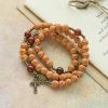 Peach Blossom Bead Rosary Bracelet: Devotion & Earthy Grace